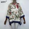 A women's bohemian summer batwing abaya top featuring a floral print on a beige fabric.