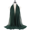 Dunkelgrüner Chiffon-Instant-Schal über einem Mannequin
