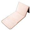 A folded pink Islamic prayer rug with quilted texture and decorative stitching.