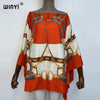 Orange and cream batwing abaya top featuring intricate gold and silver chain detailing