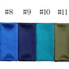 A row of twelve solid color silk satin hijab scarves numbered 7 through 12, displaying various shades of blue, green, and oli
