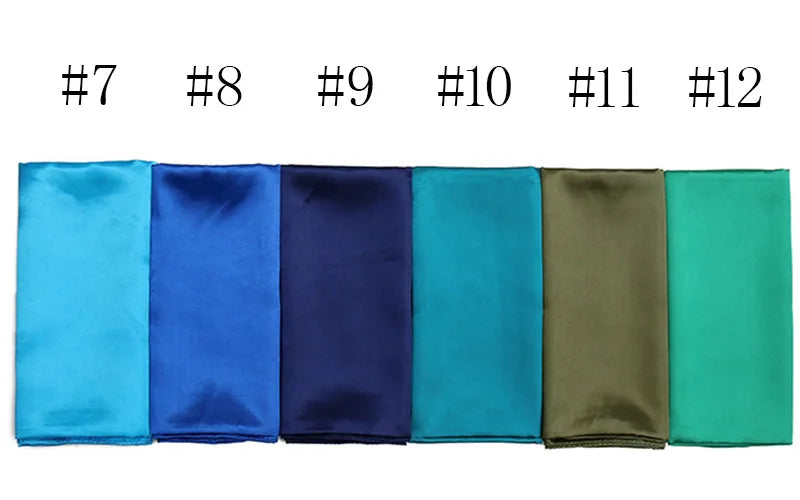 A row of twelve solid color silk satin hijab scarves numbered 7 through 12, displaying various shades of blue, green, and oli