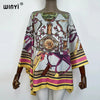 A women's bohemian summer batwing abaya top featuring intricate floral and geometric patterns in pink, yellow, and white.