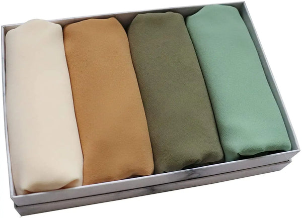 A set of four plain chiffon instant shawls in beige, tan, olive green, and mint green displayed in a rectangular box.