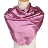 A draped solid pink silk satin hijab scarf displayed on a mannequin.
