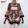 A women's bohemian summer batwing abaya top in shades of purple, pink, and brown with intricate embroidery.