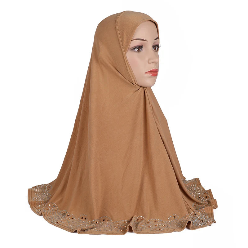Model wearing an elegant brown diamond-embellished Muslim hijab scarf.