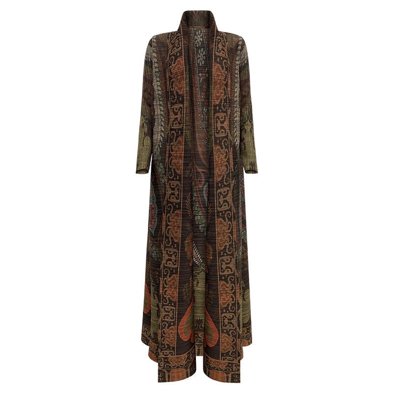Vestido vintage de color marrón oscuro con estampado, cuello abatido y falda plisada.
