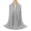 A gray soft modal jersey hijab scarf draped around a mannequin's neck.