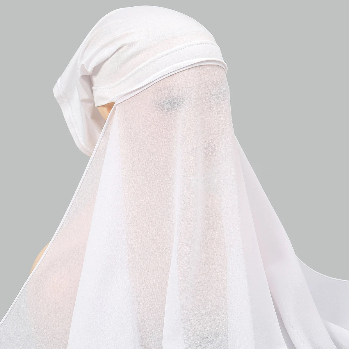 A white chiffon instant hijab with a modal cotton cap shown in a soft, translucent fabric.