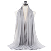 A light gray chiffon hijab scarf draped around a mannequin's neck.