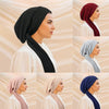 A set of solid color turban hijabs in black, maroon, and gray worn by a woman.