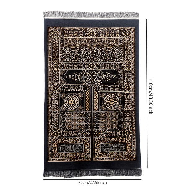 A rectangular prayer rug featuring intricate gold embroidery on a black background with a fringed edge.