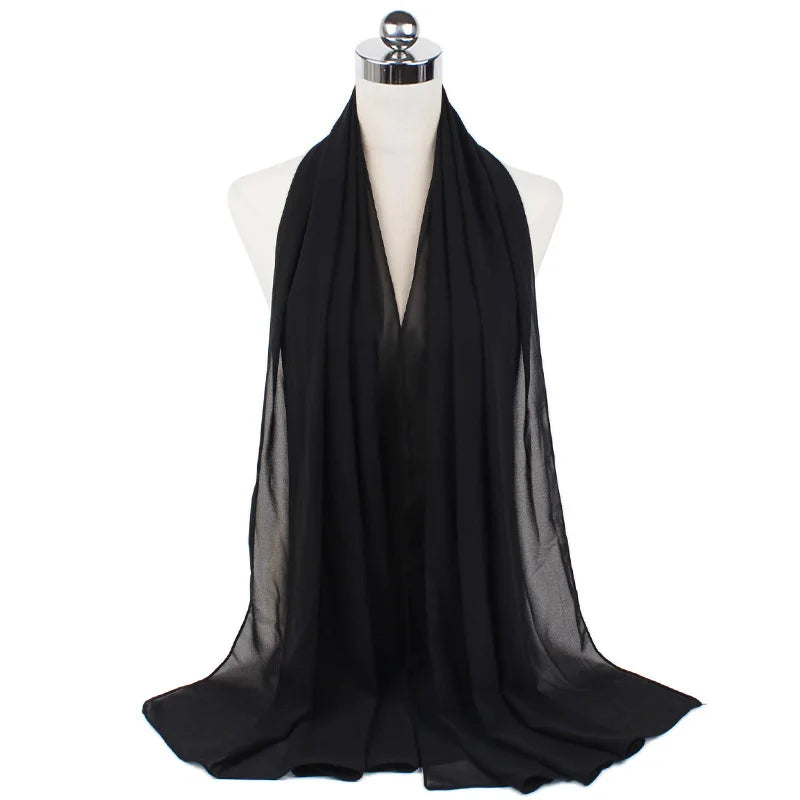 Black chiffon hijab scarf displayed on a mannequin