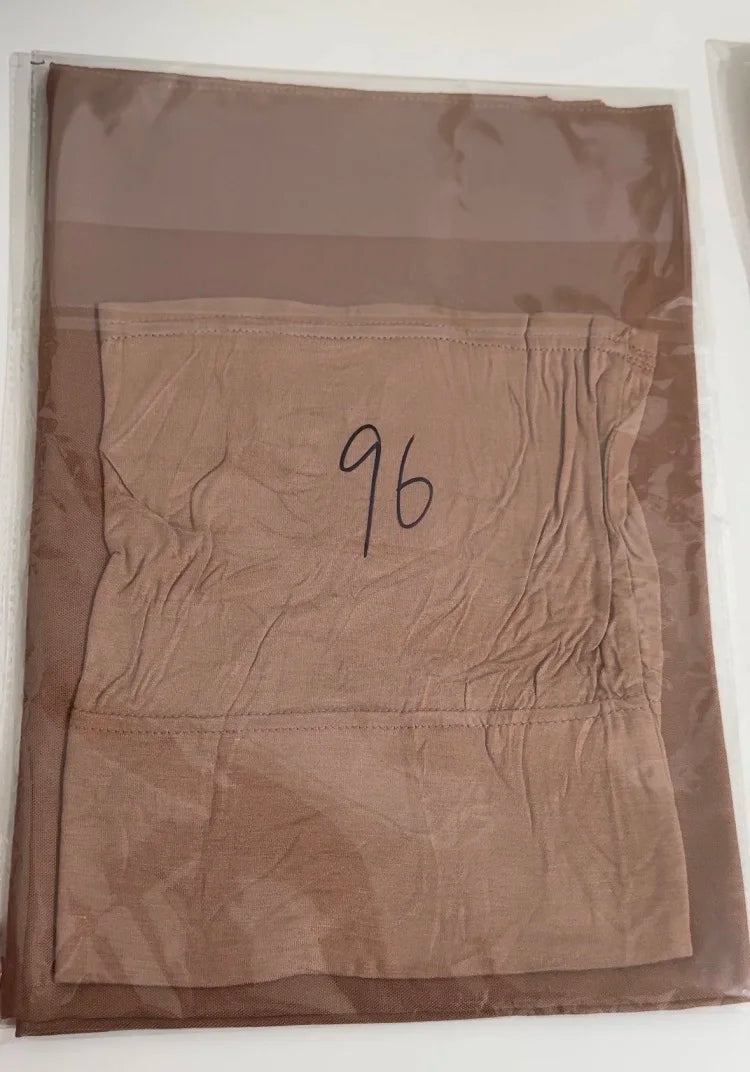 A brown soft modal rayon hijab set displayed in a clear plastic sleeve.
