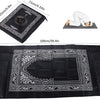 Black portable braided prayer rug featuring an ornate design and a compass element.