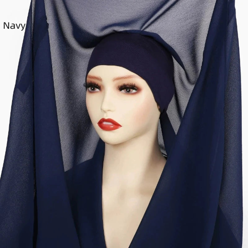 Model wearing a navy blue chiffon instant hijab with built-in magnets
