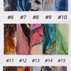 Collection de quinze foulards voiles élégants imprimés avec des motifs aquarelle et marbrés abstraits de diverses couleurs