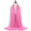 A bright pink chiffon hijab scarf draped around a mannequin's neck.