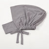 A soft gray inner hijab cap scarf made of cotton polyester with a gathered knot and ties.