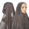 A model wearing a sheer gray chiffon instant hijab with a modal cotton cap.