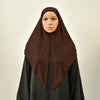Model wearing a dark brown instant hijab scarf and black garment.