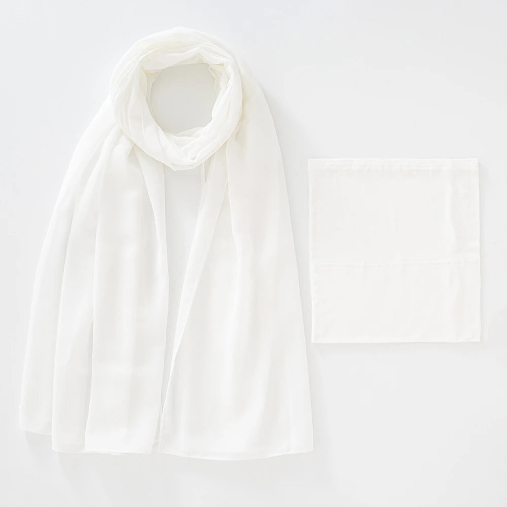 A white chiffon hijab and undercap set displayed flat against a light background.