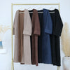 Elegant women's abaya trench coat displayed on a gold hanger against a white background.