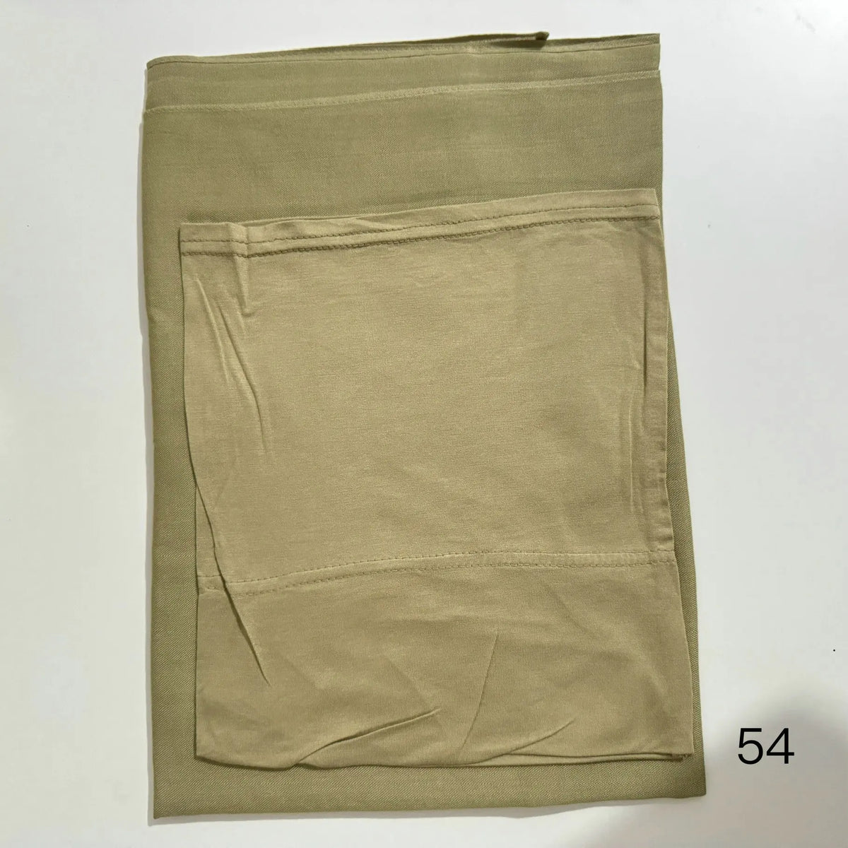 A beige soft modal rayon hijab set for women shown flat.