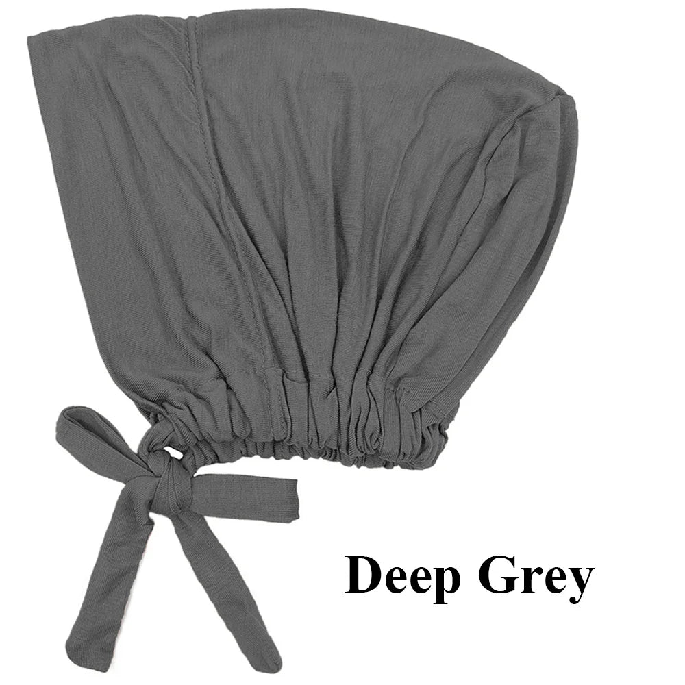 Pañuelo elegante turbante de modal gris oscuro doblado y atado