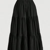 Falda midi A-line bohemia negra con detalle de volantes escalonados