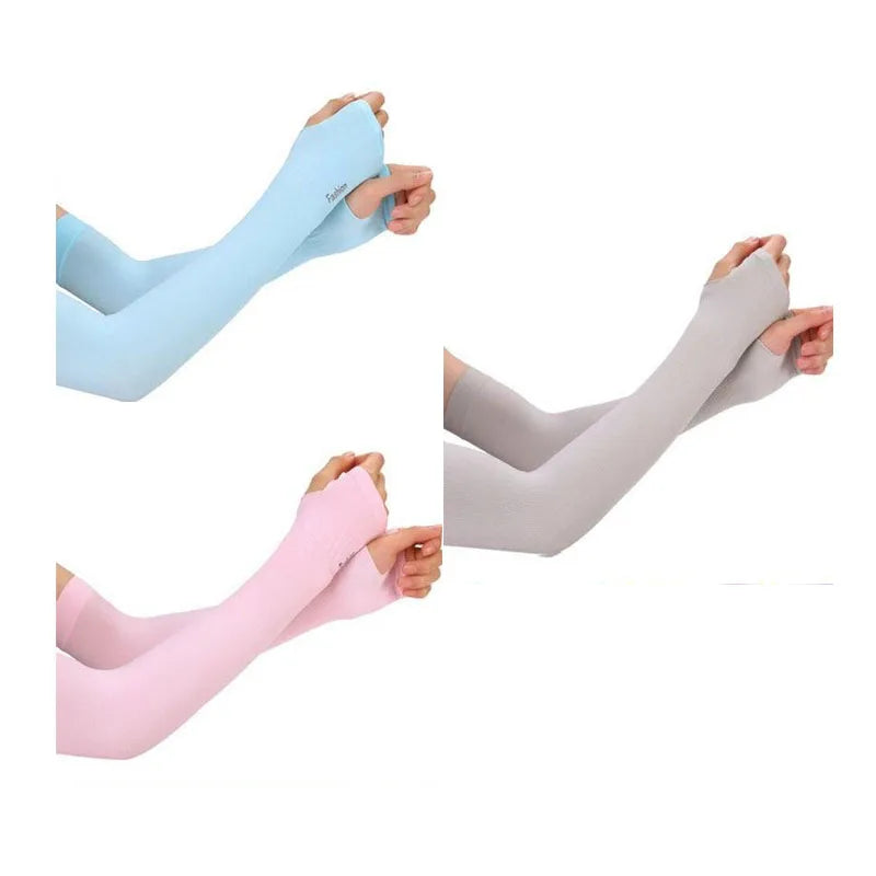 Three arm sleeves in light blue, gray, and pink are shown being worn on an arm.