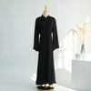 A black elegant two-piece Arabic modest set displayed on a mannequin against a white background.