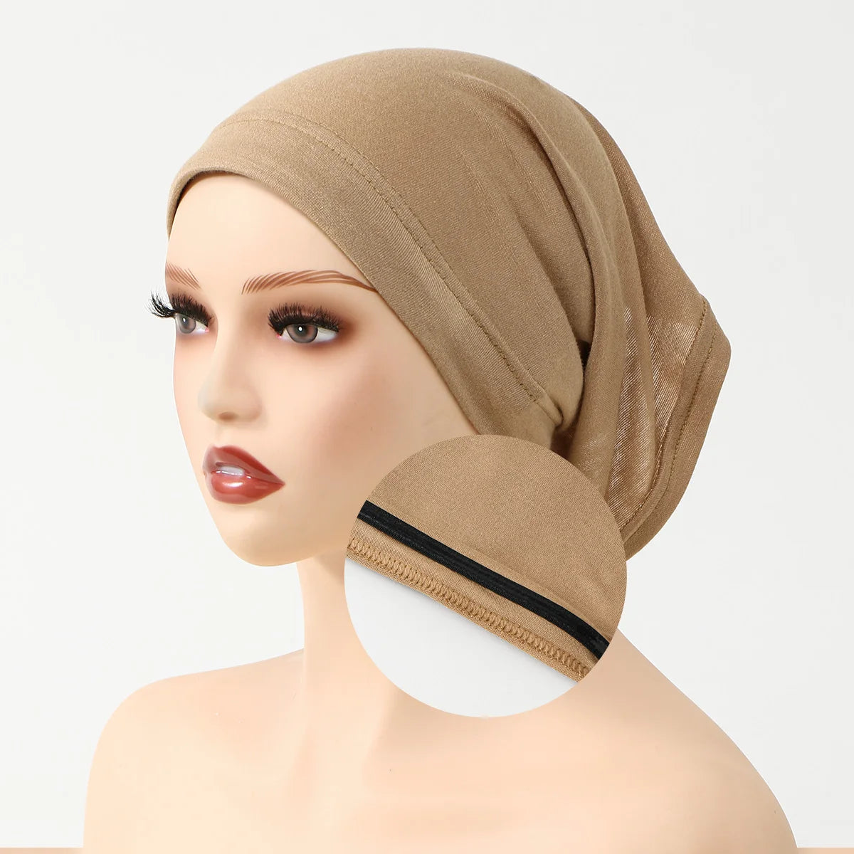 A beige elegant anti-slip inner hijab cap displayed on a mannequin head.