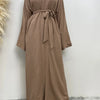 A full-length, loose-fitting brown abaya or kaftan dress with a tied neck and waist detail.