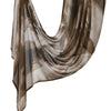 A flowing, sheer linen hijab scarf with abstract brown and beige watercolor print.