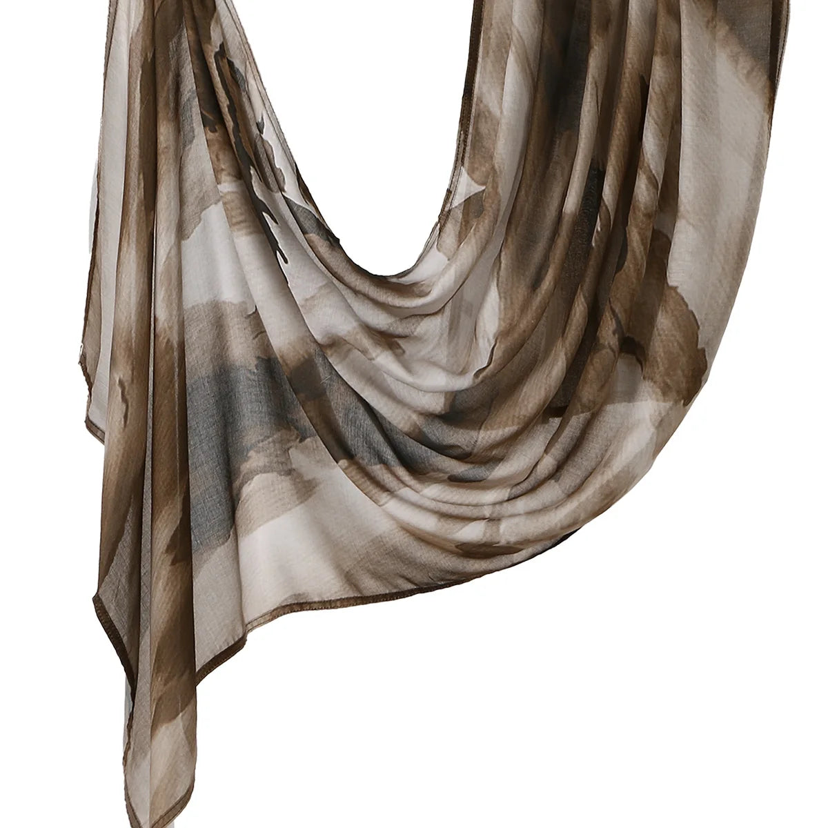 A flowing, sheer linen hijab scarf with abstract brown and beige watercolor print.
