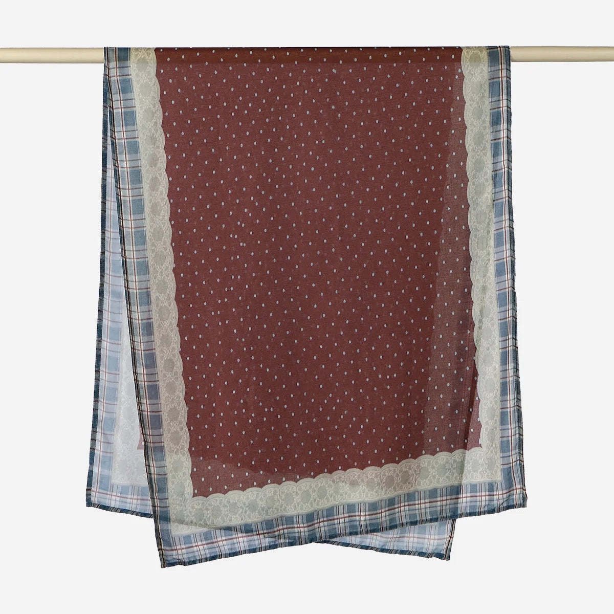 A maroon linen hijab scarf with a light blue patterned border hanging on a rod.