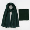 A dark emerald green chiffon hijab and underscarf set displayed flat.