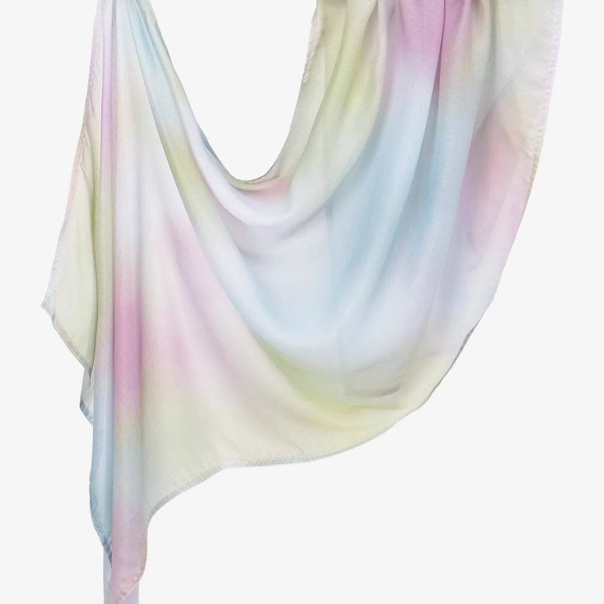 Elegant printed linen hijab scarf draped softly with pastel pink and blue watercolor tones