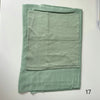 A light sage green soft modal rayon hijab set folded neatly.