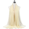 A cream colored chiffon hijab scarf draped on a mannequin.