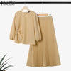 Ensemble haut à manches longues beige et jupe plissée pour tenue musulmane.