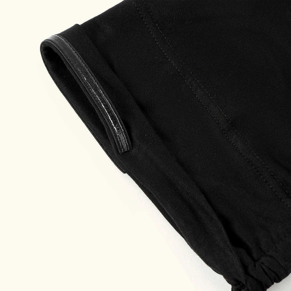 Black anti-slip inner hijab cap shown in a close-up view.