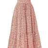 Una falda midi A-line bohemia color óxido con estampado floral blanco pequeño.
