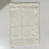 A white soft modal rayon hijab set folded neatly on a light surface.