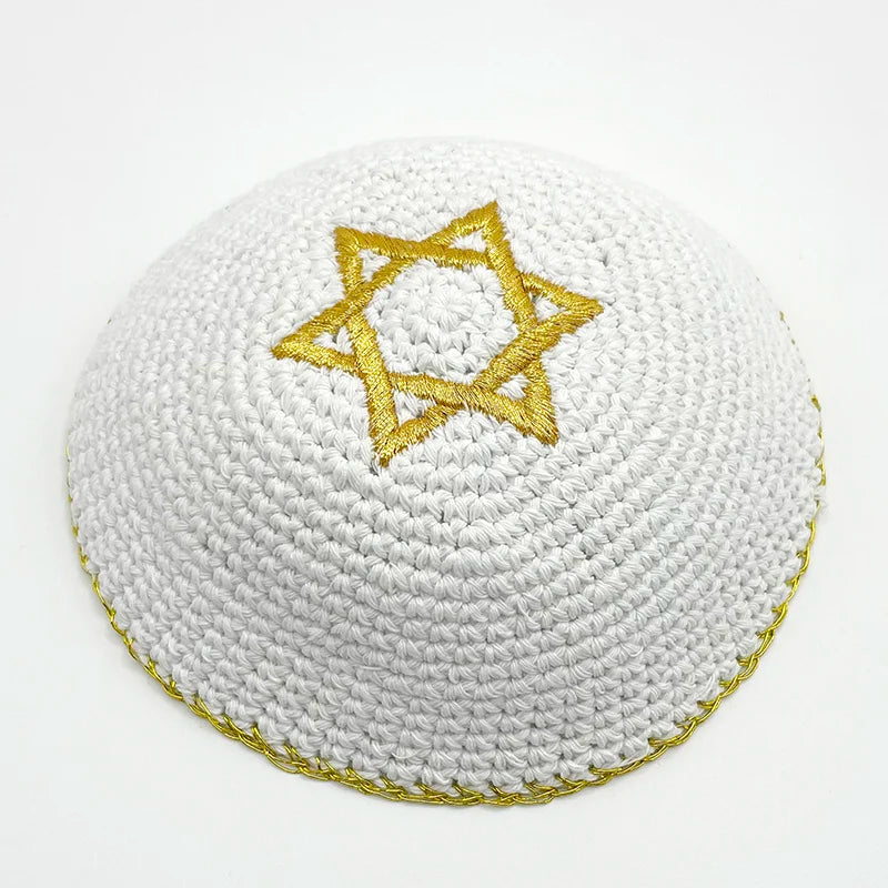 Kippah or yarmulke hand-knitted in white with gold Star of David embroidery.