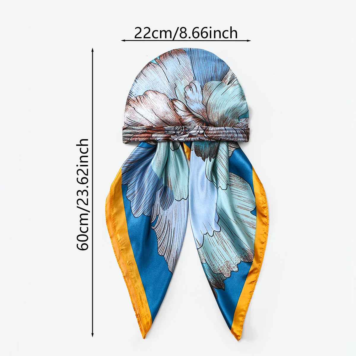 Gefalteter bedruckter Satin-Seideschals mit blauen und goldenen Stoffen und Blumenmustern.
