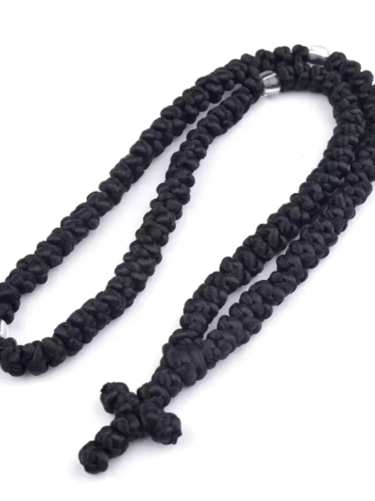Rosario de oración hecho a mano negro con cuerda y cuentas de plata