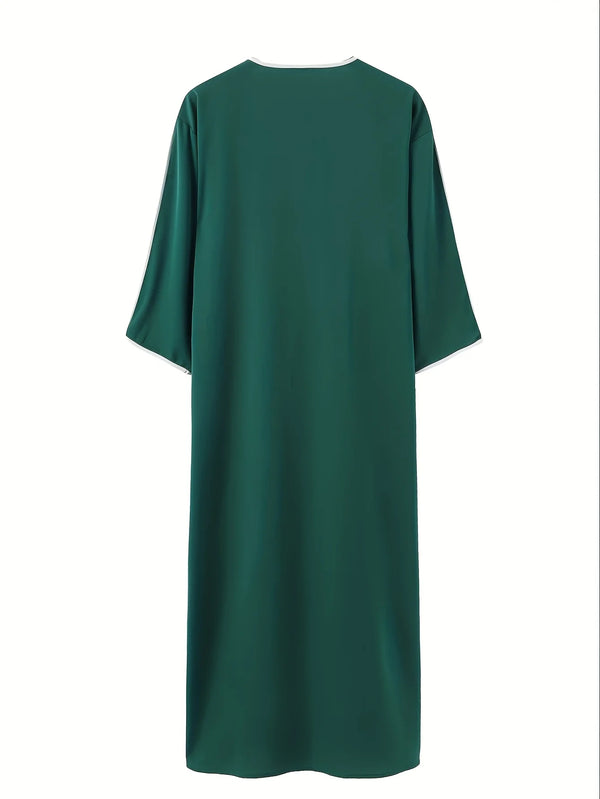 A dark emerald green, long-sleeved Muslim robe for men.